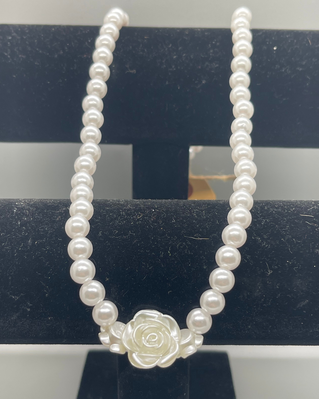 Plastic pearl costume necklace