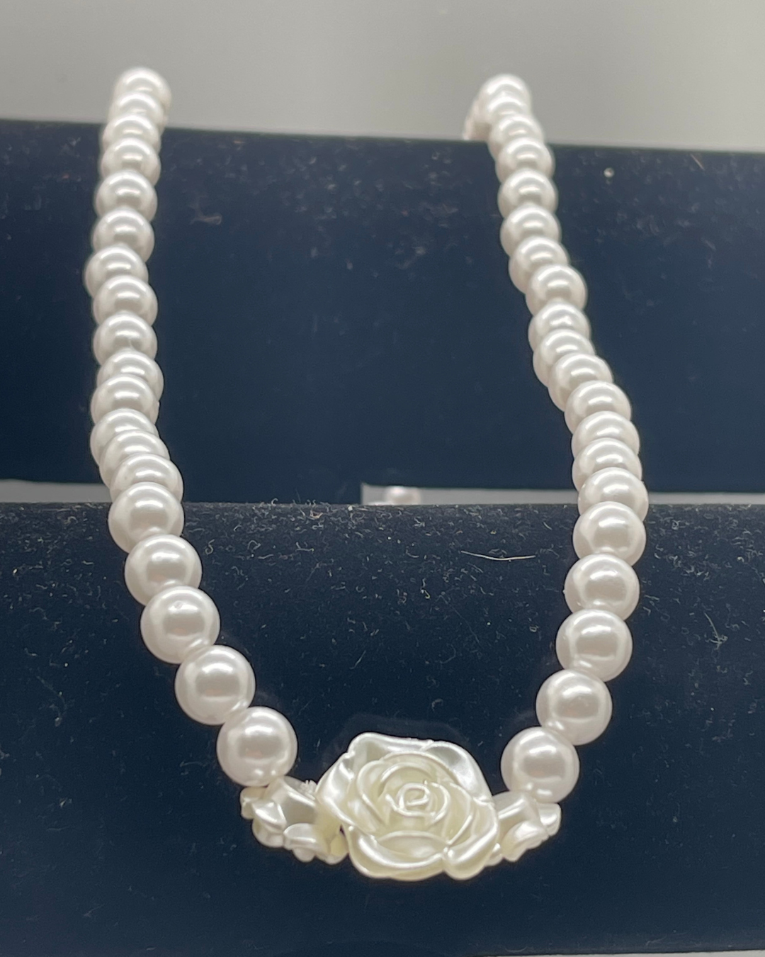 Plastic pearl costume necklace