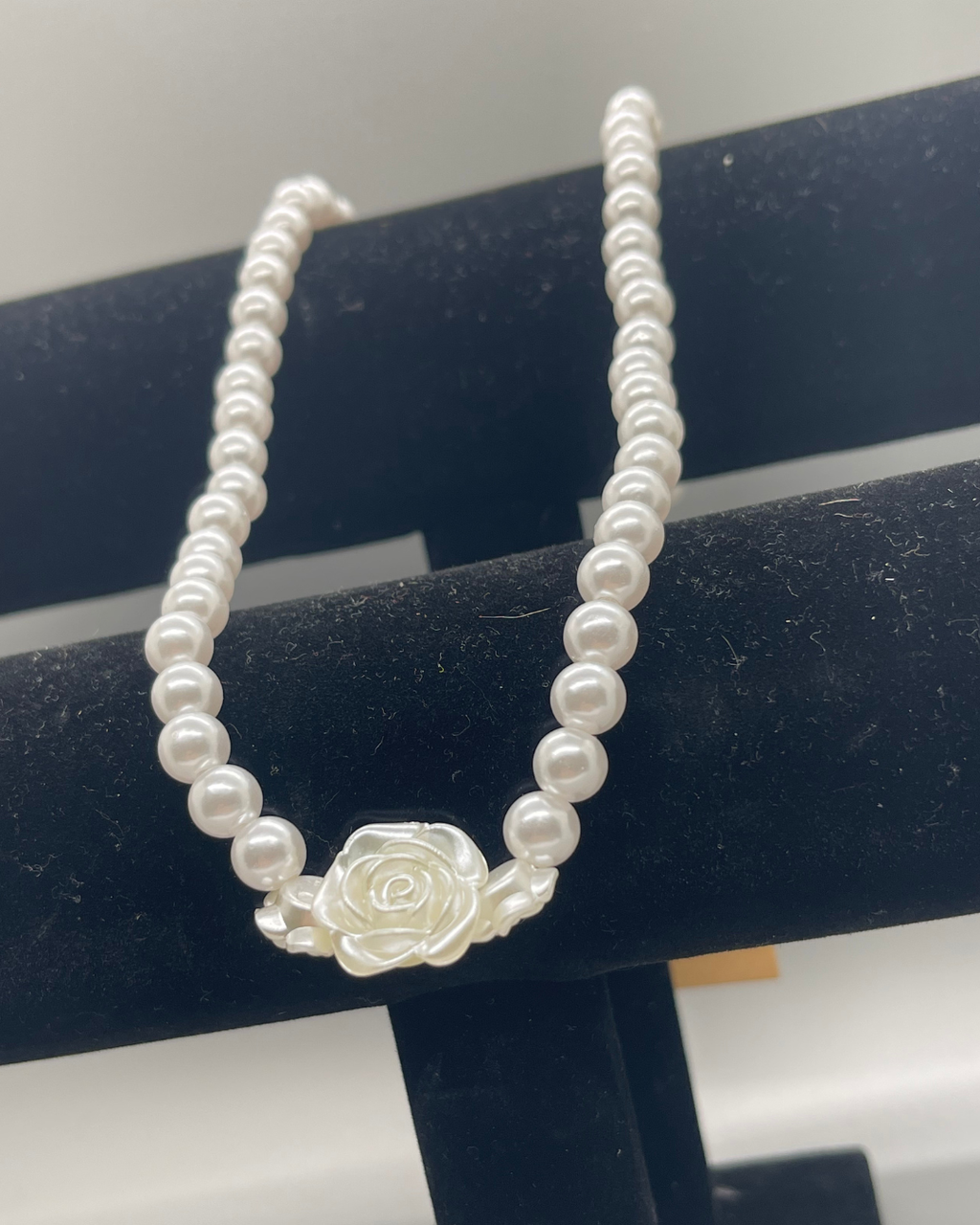 Plastic pearl costume necklace